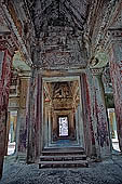 Angkor Wat temple, the crossing cloister, the tympana motifs. 